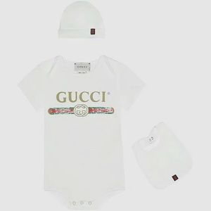 Gucci onesie with matching bib and beanie